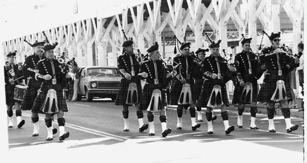 Illawarra Pipe Band early 1970's decade with Bob Webber on the front right